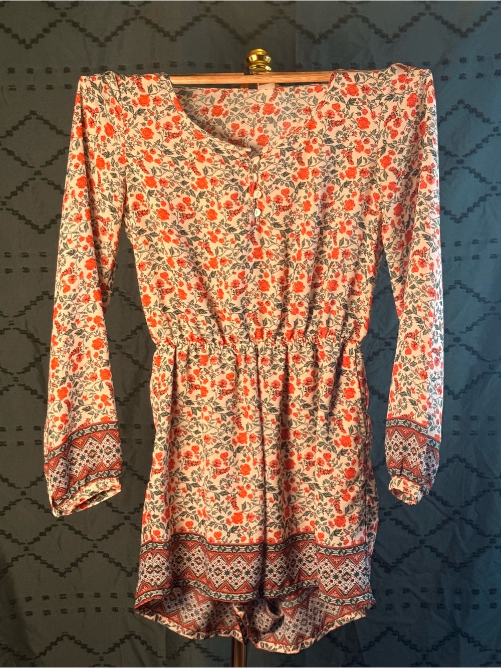 Divided Cream Romper with Coral Floral Print